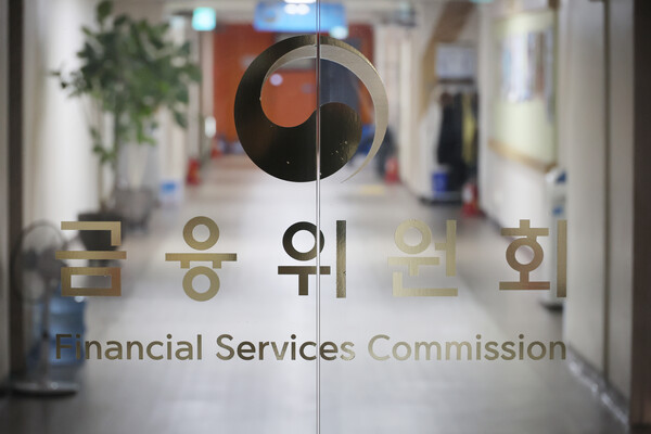 13日，韩国金融服务委员会选定KDX-NXT财团作为场外交易（OTC）分散投资交易所的初步牌照持有者。（韩联社）